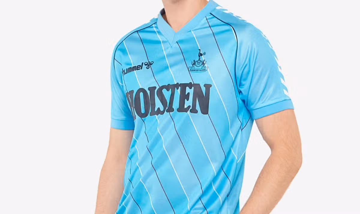The man in the Spurs 1985/87 shirt
