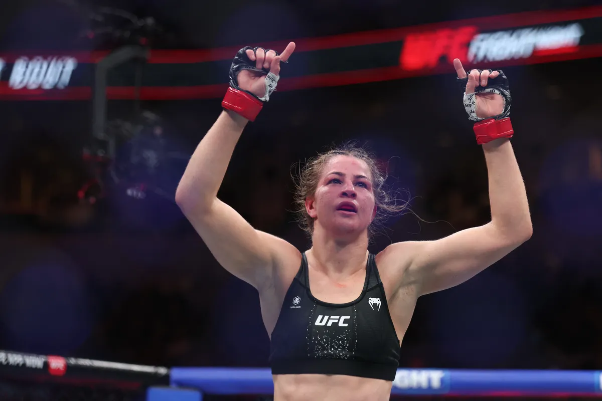 April 18, 2026; Winnipeg, Manitoba, CANADA; Jasmine Jasudavicius (red gloves) celebrates after her fight against Karine Silva (blue gloves) during UFC Fight Night at the Canada Life Centre. Mandatory credit: Bruce Fedyck-Imagn Images