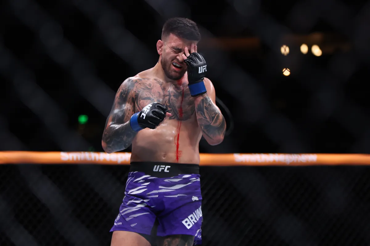 June 14, 2025; Atlanta, Georgia, United States of America; Mansoor Abdul-Malik (red gloves) fights Cody Brundage (blue gloves) during UFC Fight Night at State Farm Arena. Mandatory credit: Brett Davis-Imagn Images