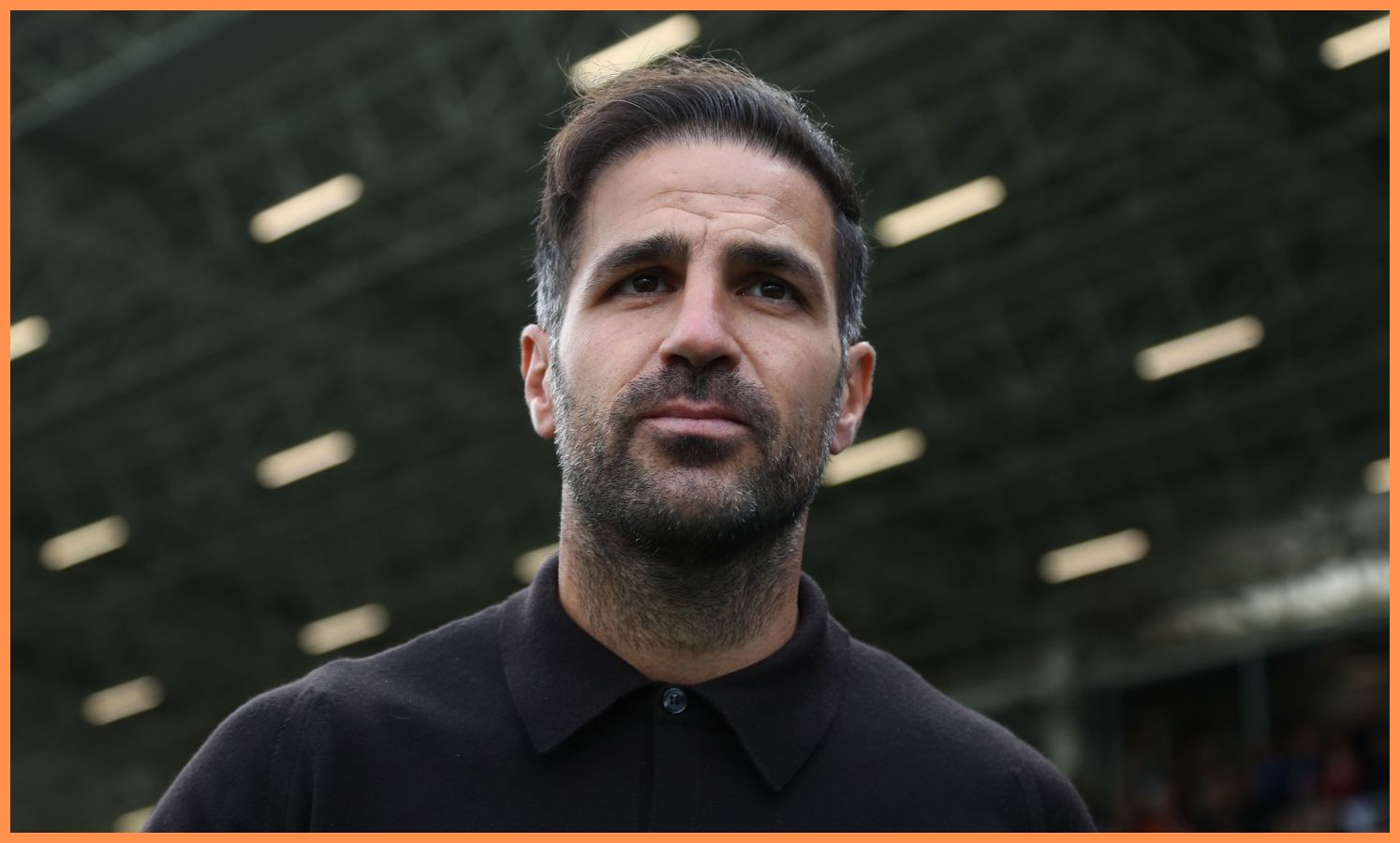 Como manager Cesc Fabregas looks on