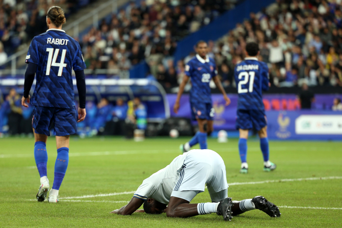 PARIS, FRANCE - OCTOBER 02: Michael Kayode of Italy reacts with Adrien Rabiot during the UEFA Nations League 2026/27 group stage match between France and Italy at Stade de France on October 02, 2026 in Paris, France. (Photo by Pauline Figuet/Getty Images)