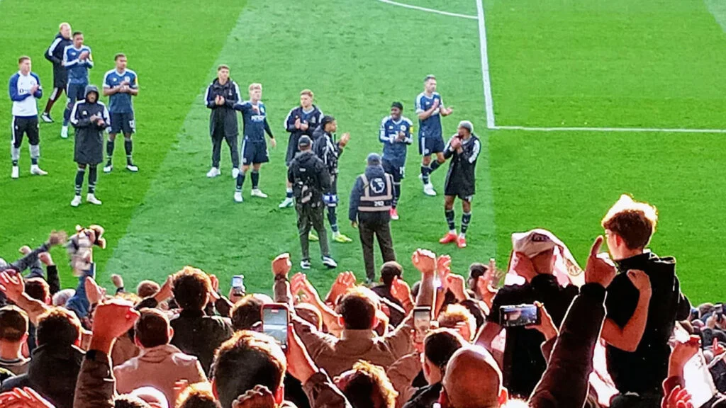 Newcastle United players cheer for Crystal Palace fans at Selhurst Park