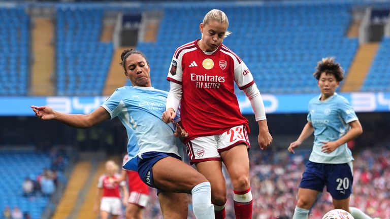 Alessia Russo competes for the ball